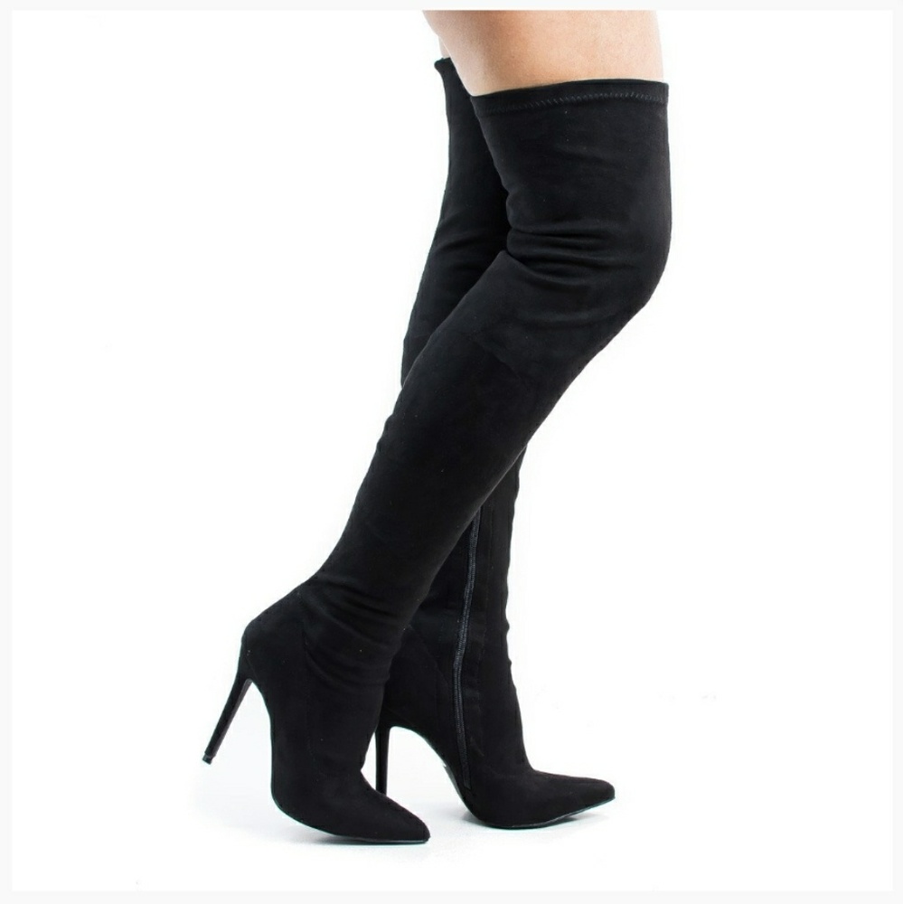 Over the thigh black boots